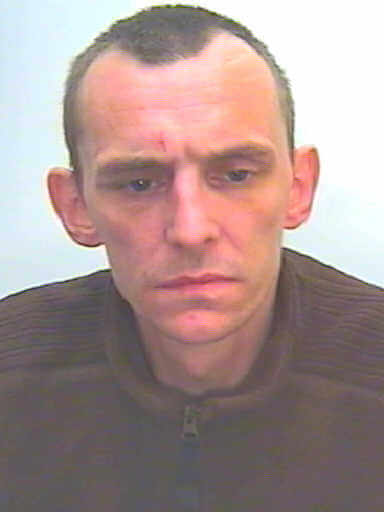 Police photo of Calvin Wood, wanted on recall to prison