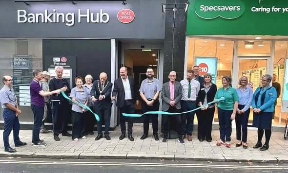 Ribbon cutting outside Camborne Banking Hub