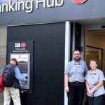 Staff outside Camborne Banking Hub on Trelowarren Street