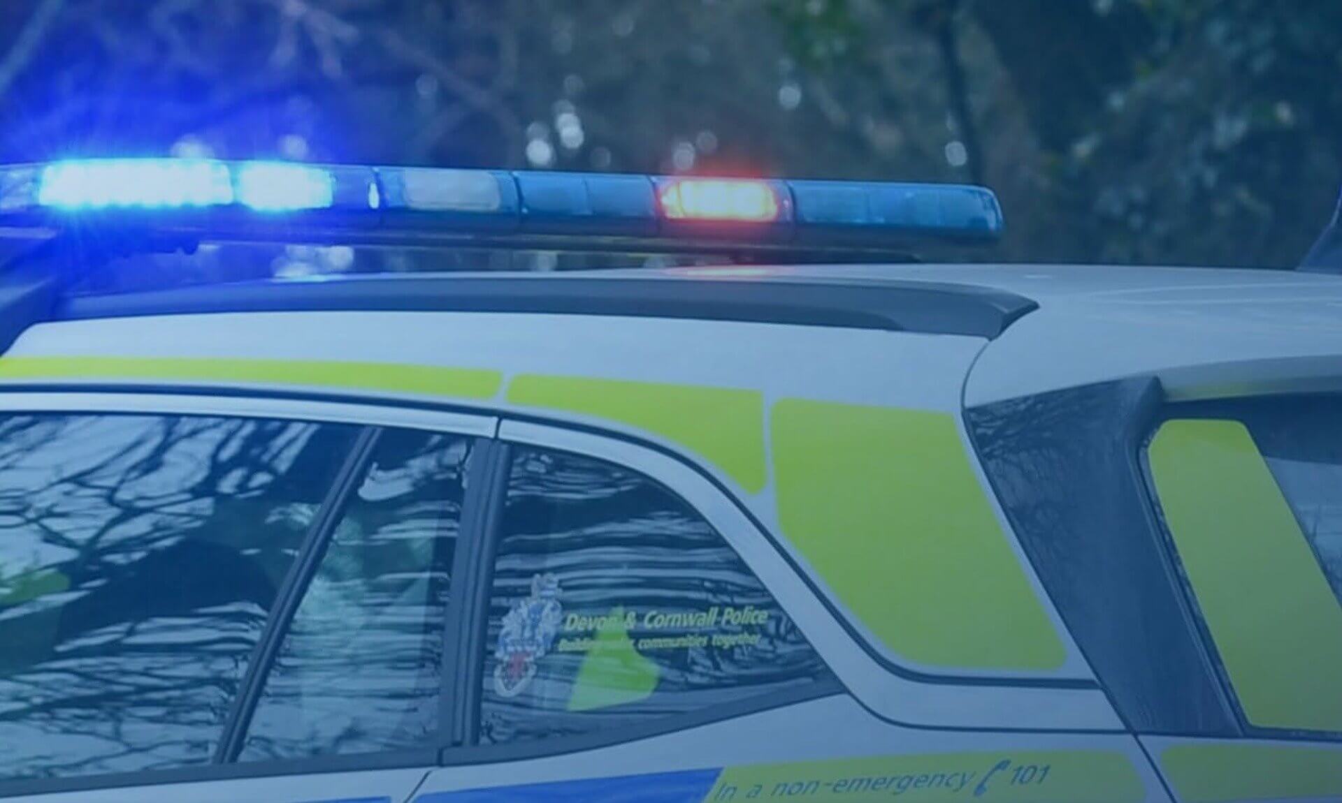 Devon and Cornwall Police car with blue lights