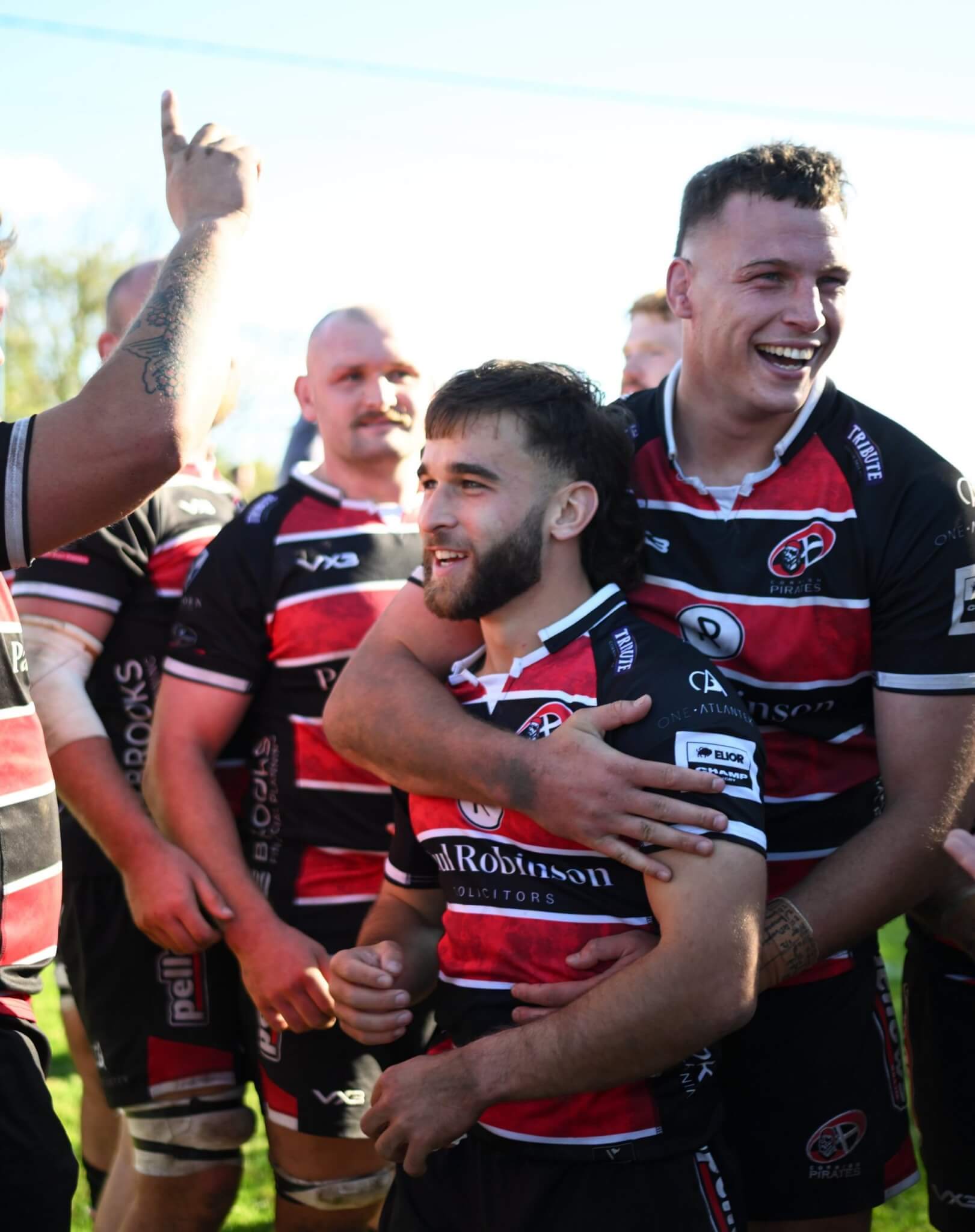 Smiling Cornish Pirates players celebrating after the win over Chinnor