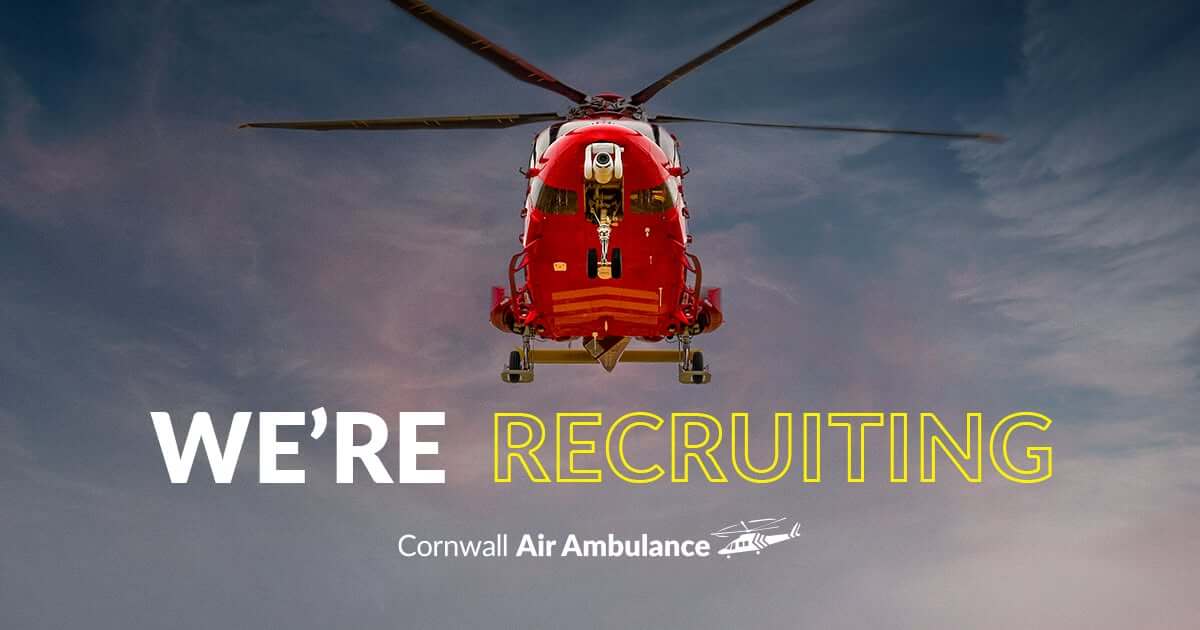 Cornwall Air Ambulance helicopter with We're Recruiting graphic