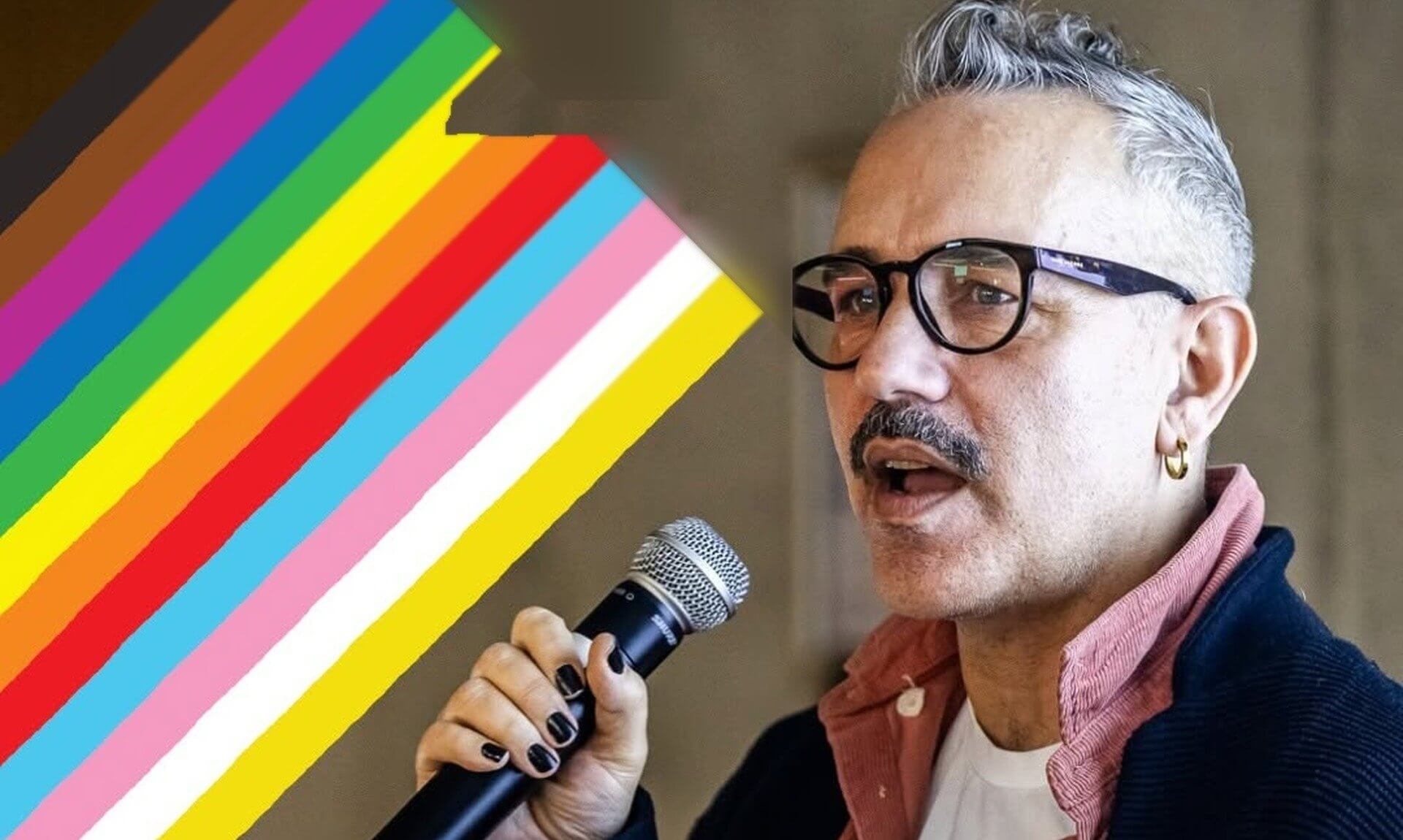 Speaker holding a microphone beside Progress Pride flag stripes, from the Cornwall Pride Inclusion Conference 2026 poster