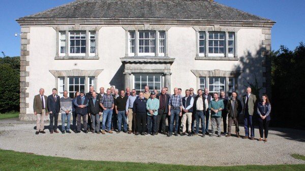 Former students gathered outside a large house at Duchy College Stoke Climsland