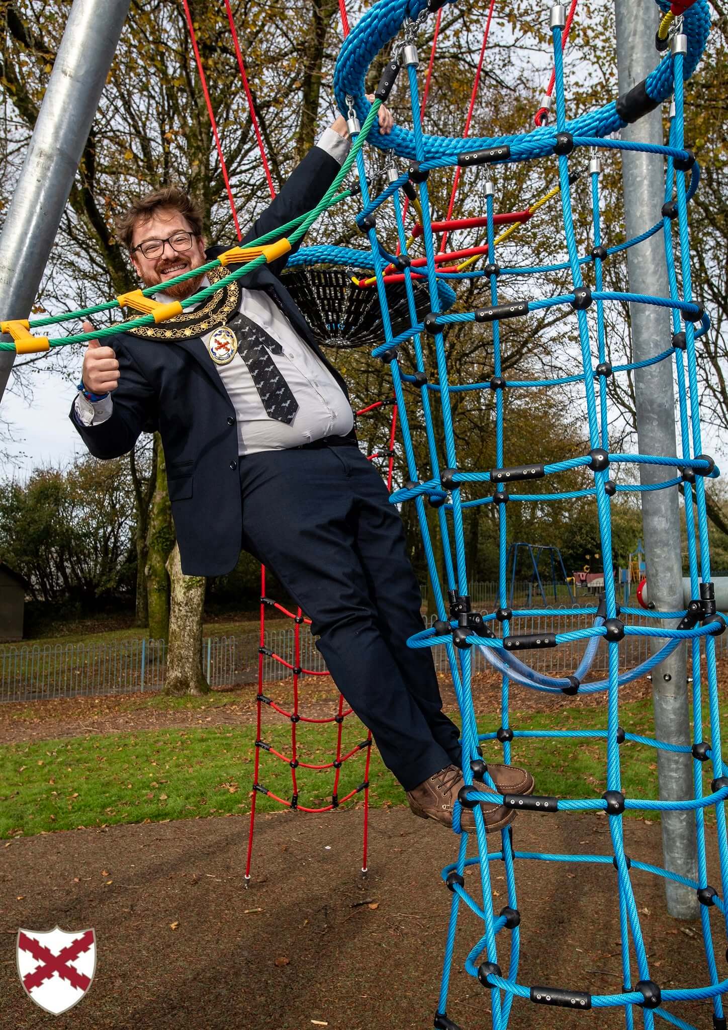 St Austell Mayor Ethan Stephens climbing the rope net on the Bird's Nest Tower
