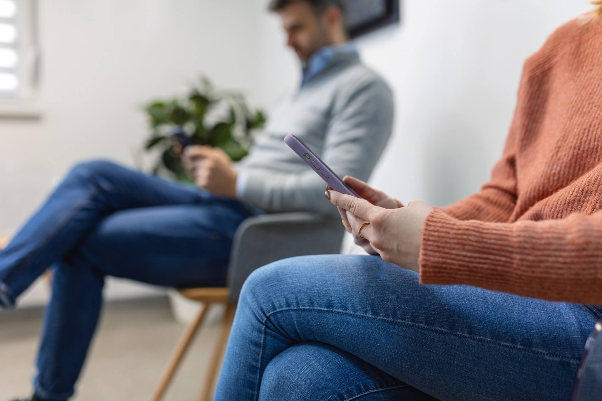 People sitting in a GP surgery waiting room