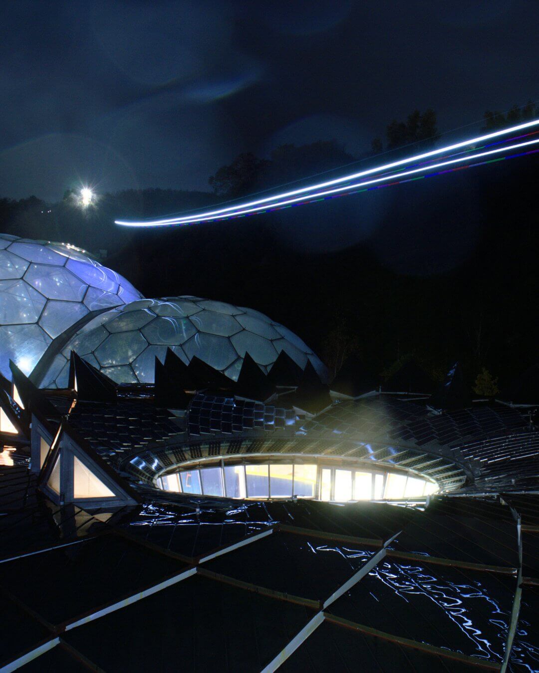 Skywire light trail over the Eden Project biomes at night