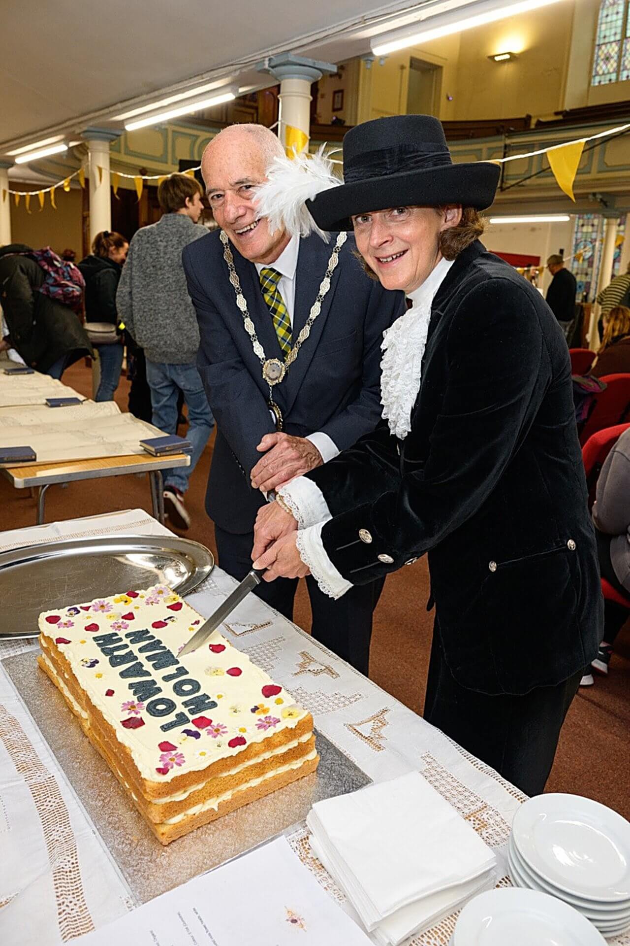 The High Sheriff and the Mayor of Camborne cutting the Lowarth Holman cake