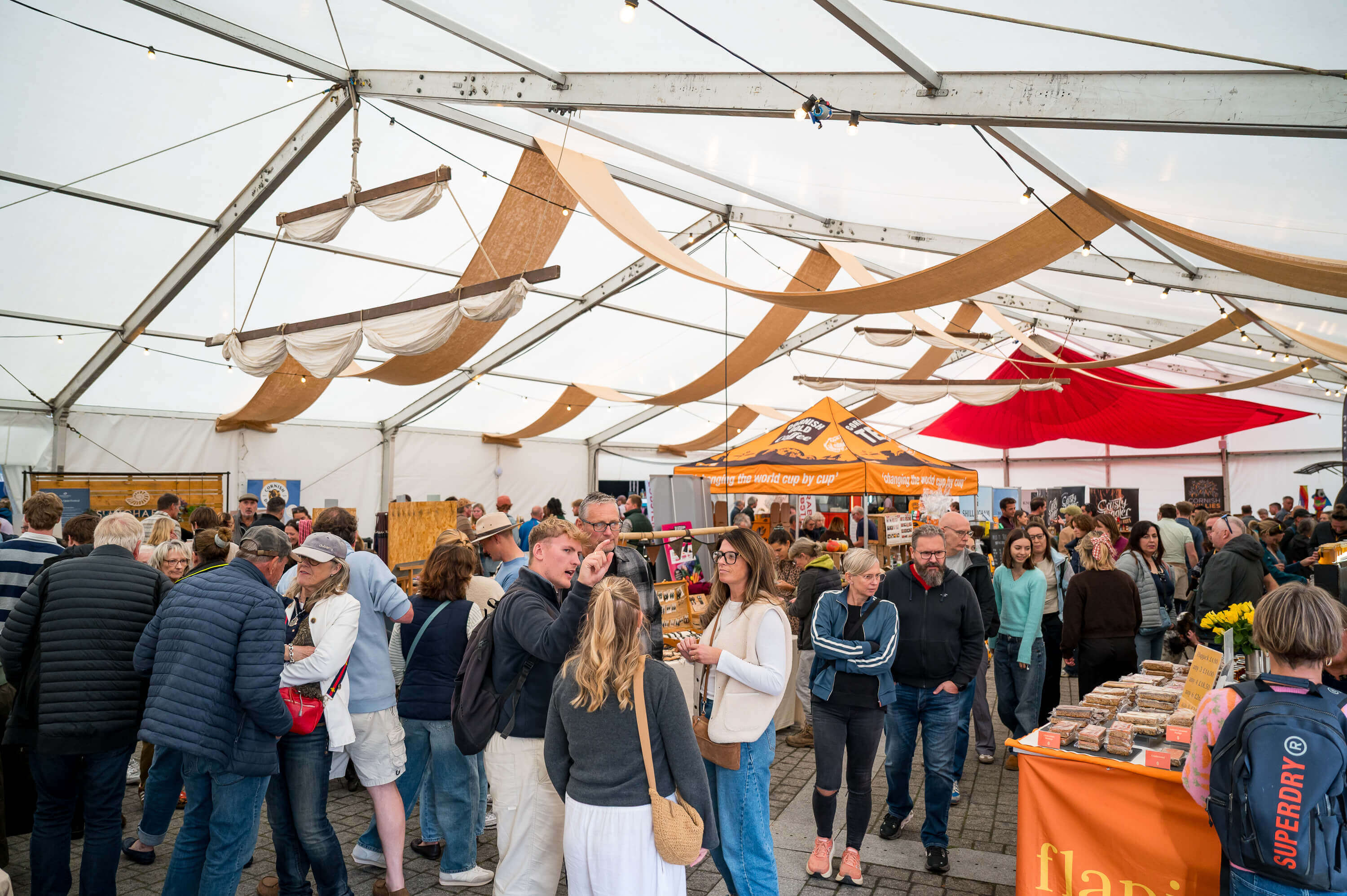 Crowds browsing the festival market marquee in Falmouth