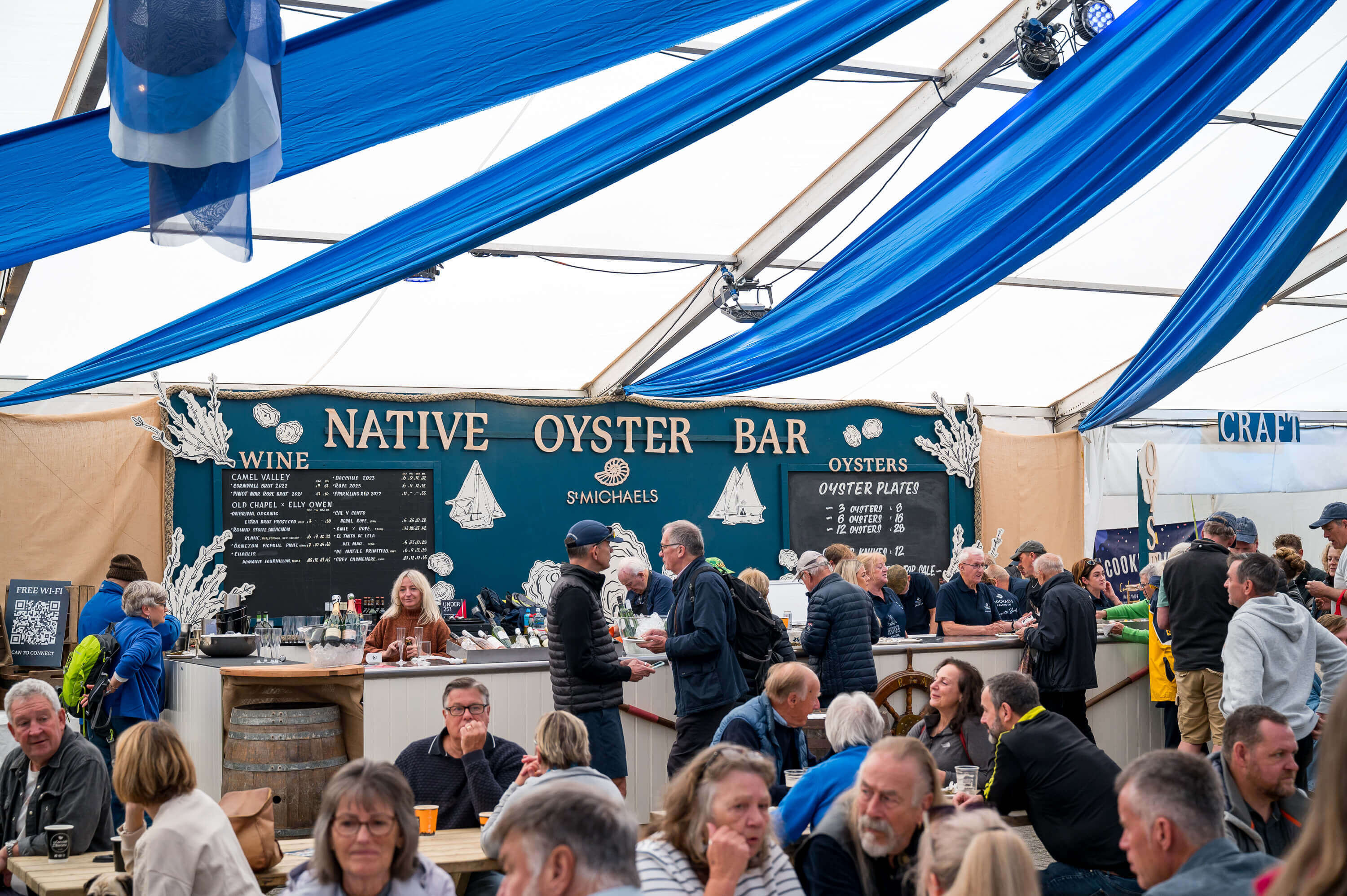 Visitors at the Native Oyster Bar at Falmouth Oyster Festival