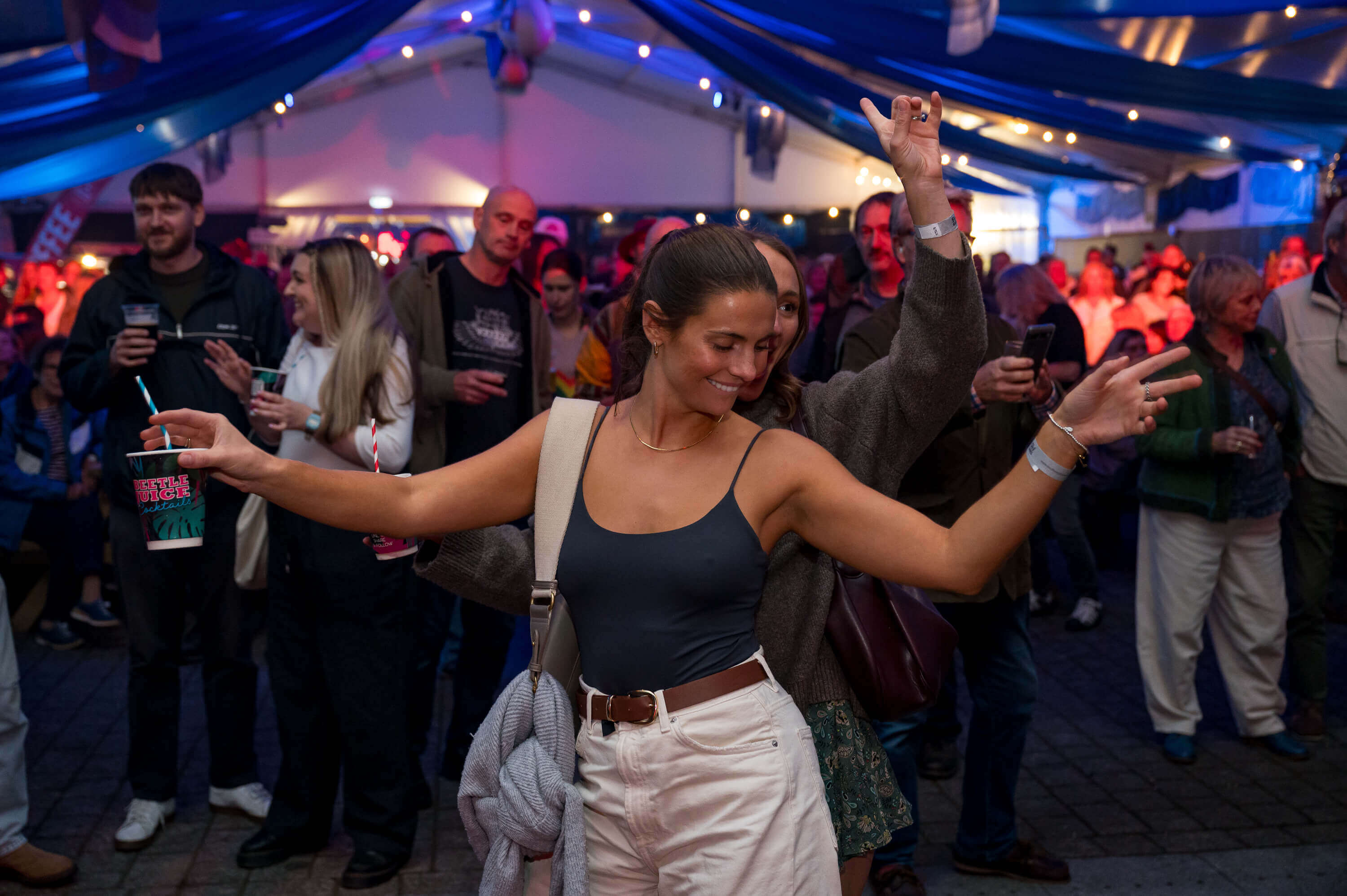 Festival-goers dancing in the marquee at Falmouth Oyster Festival