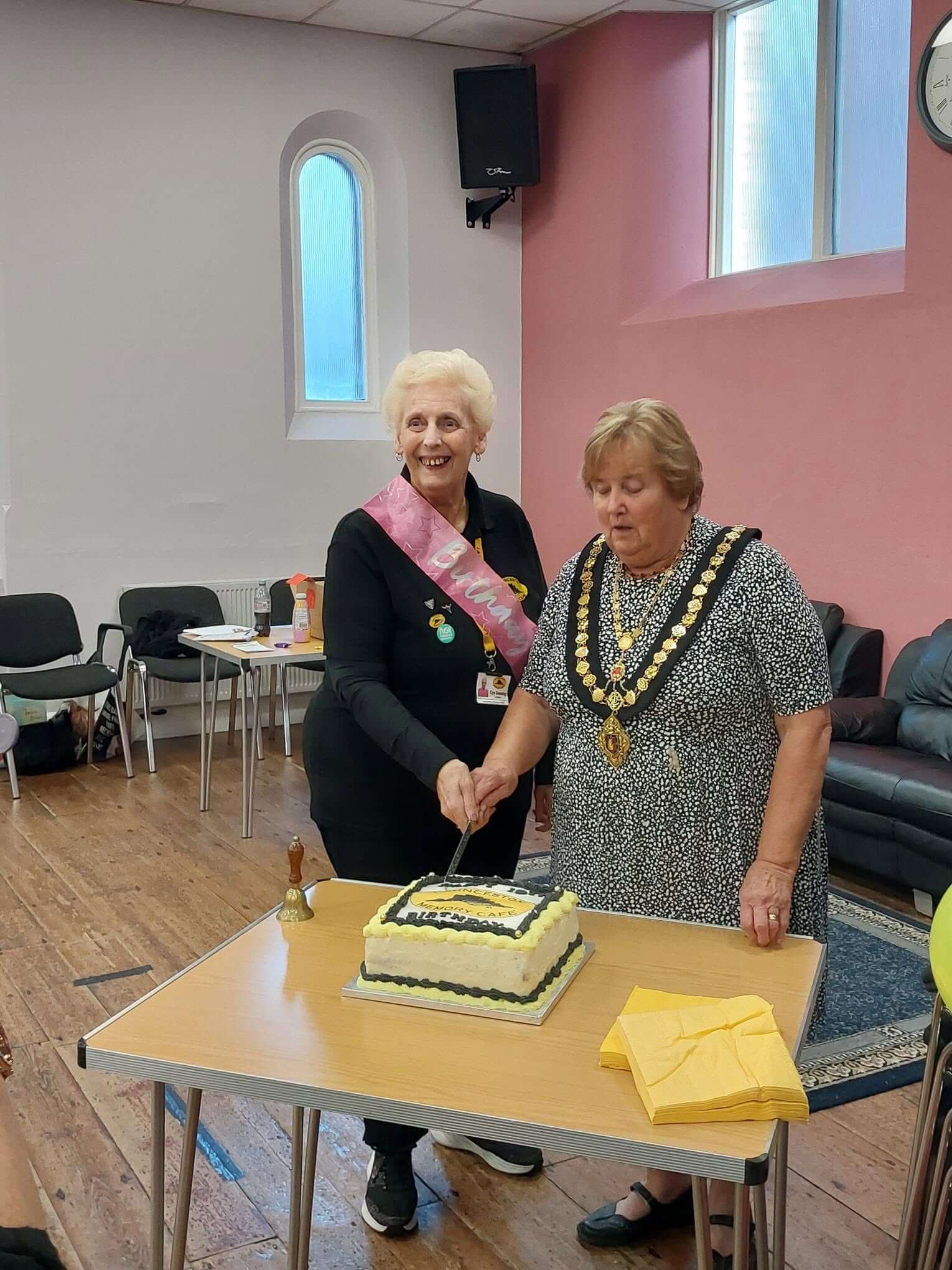 Cutting the cake at the Launceston Memory Café's 19th birthday