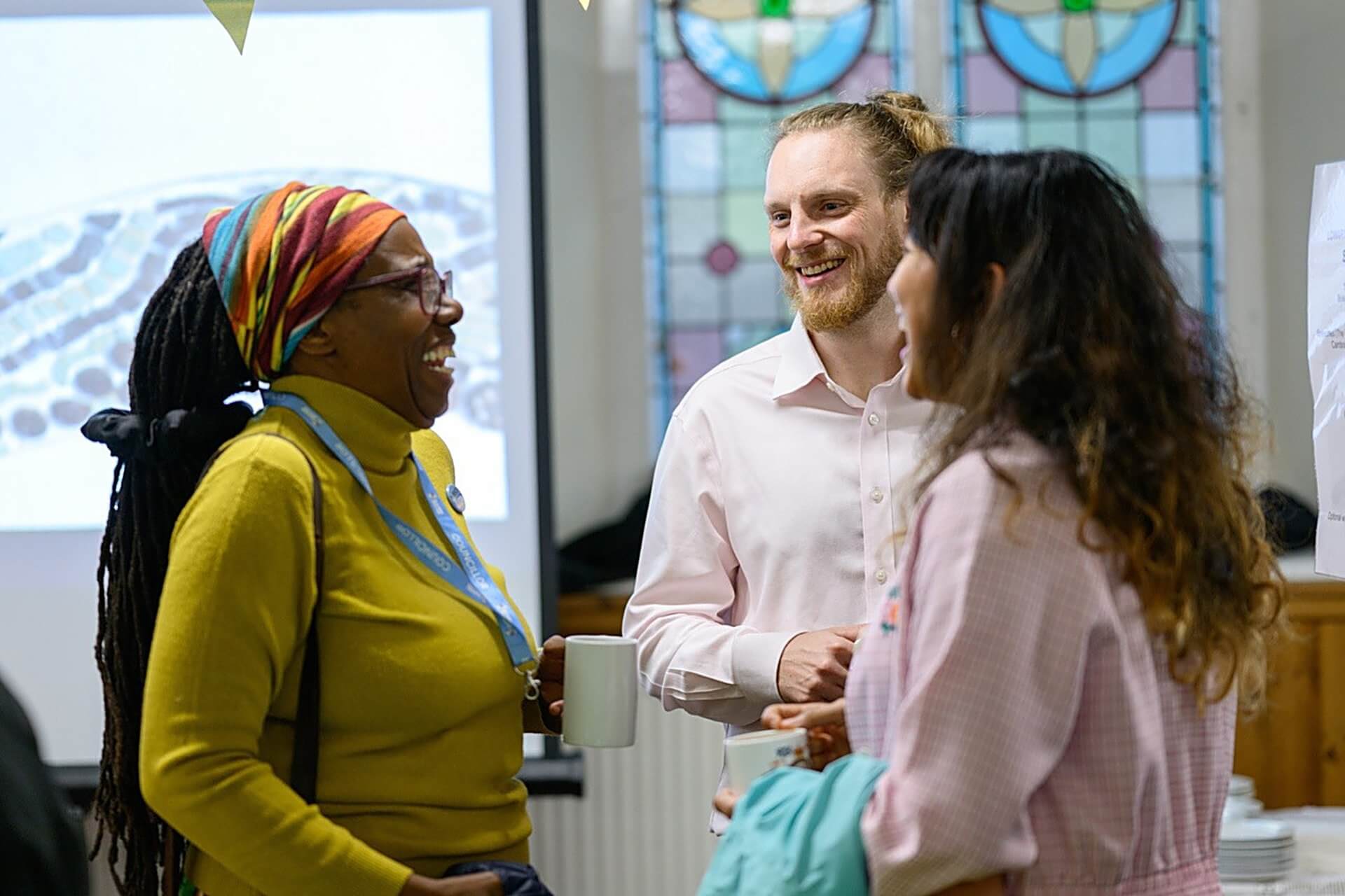 Guests chatting at the Lowarth Holman opening