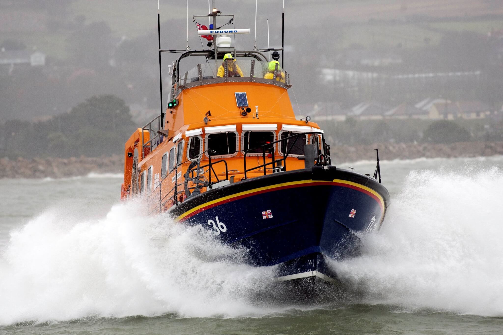 Penlee lifeboat Ivan Ellen heading straight towards the camera through spray