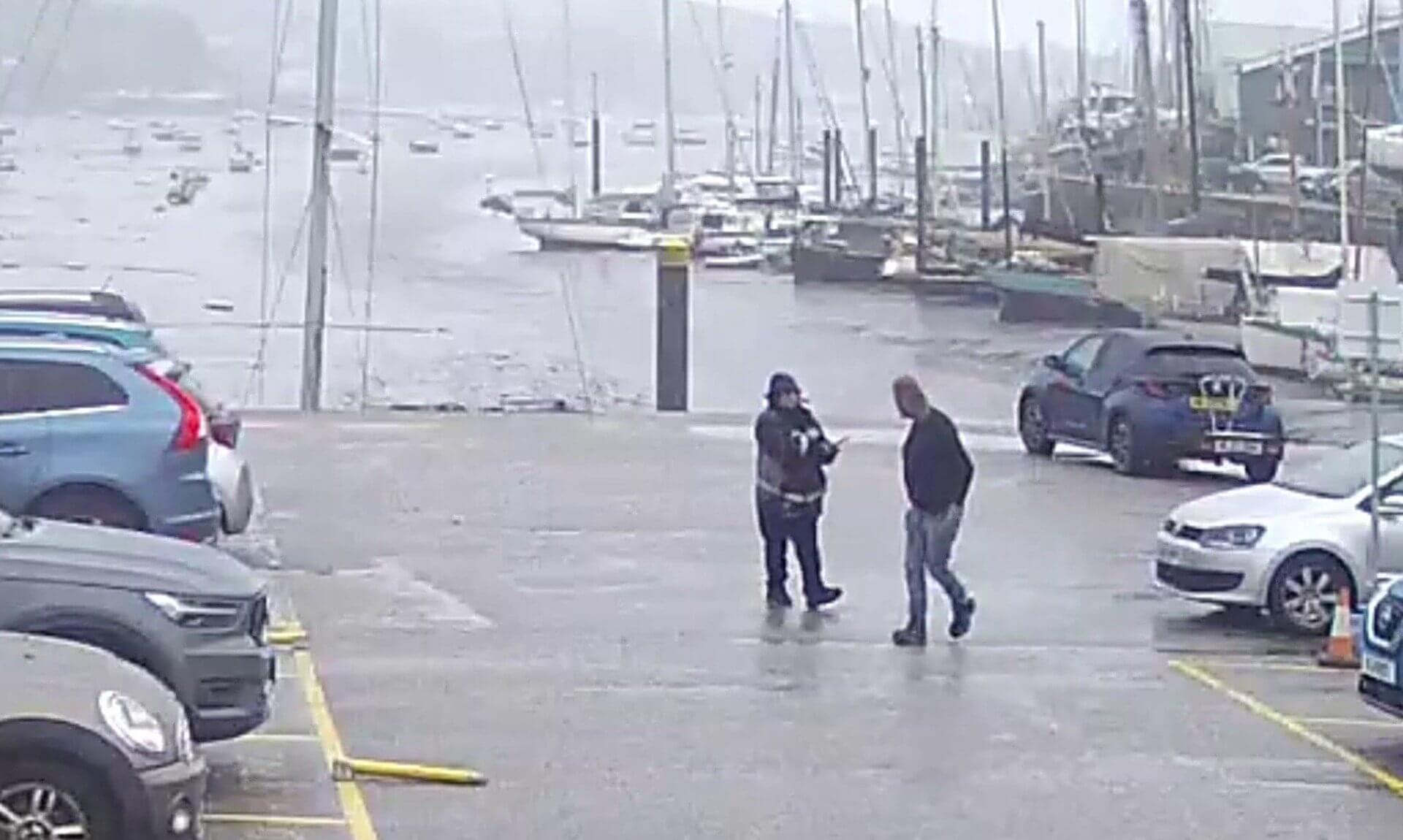 CCTV image of a man and a civil enforcement officer in Exchequer Quay car park, Penryn