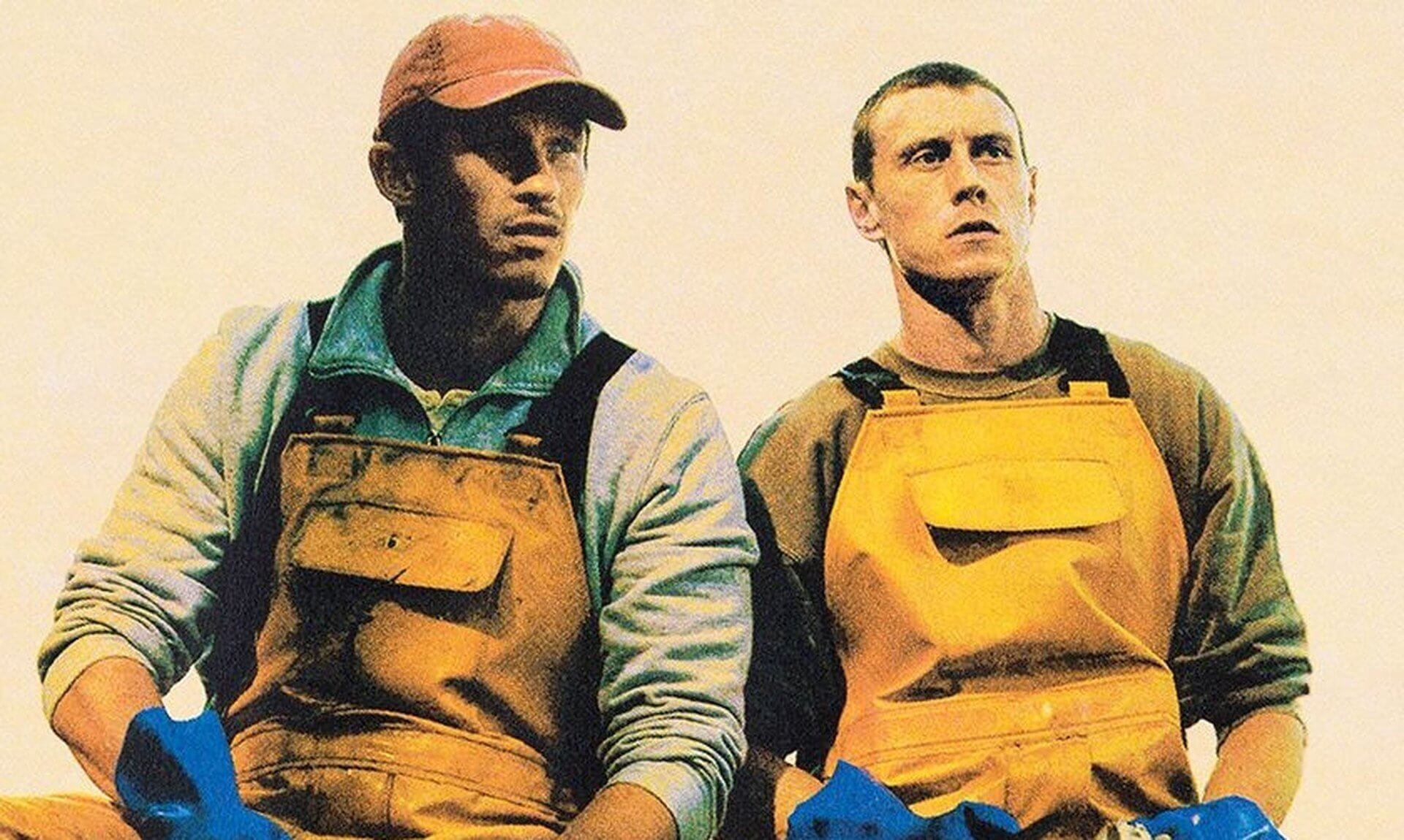 George MacKay and Callum Turner in fishing oilskins in Rose of Nevada
