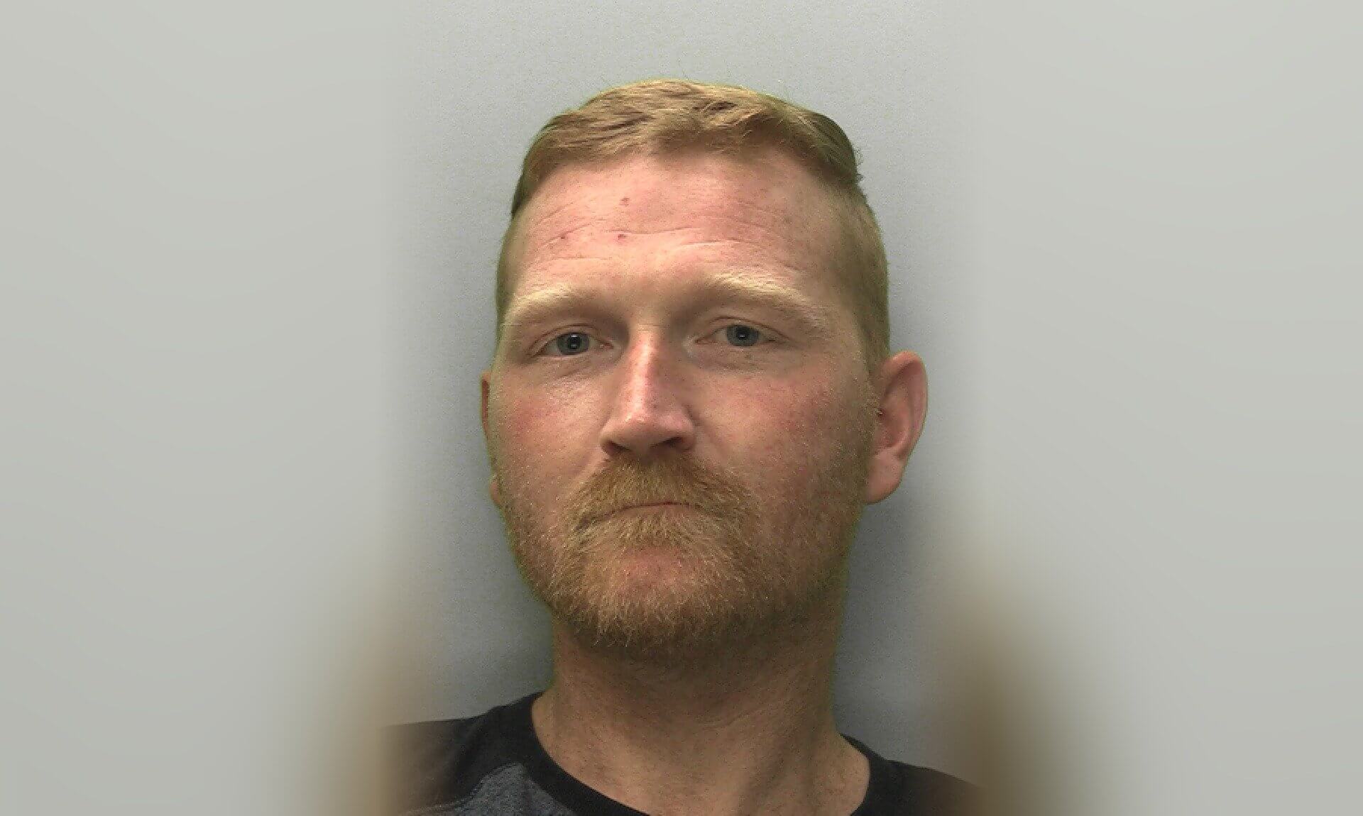 Police custody photo of Jonathan Simpson