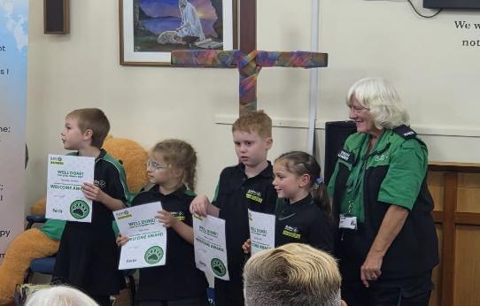 St John Ambulance Liskeard Badgers holding their certificates
