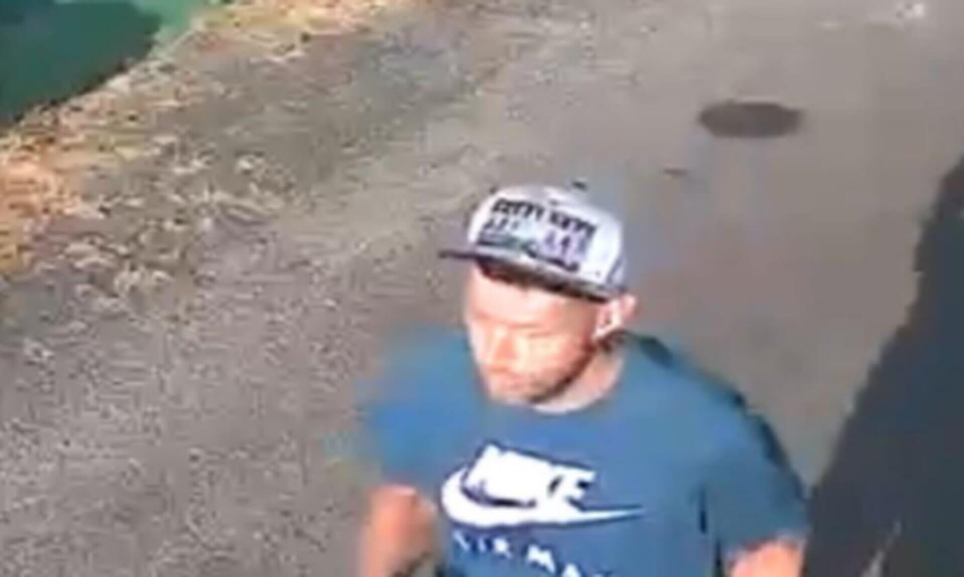 Man in a cap and blue Nike t-shirt whom police want to identify after an assault in Torpoint