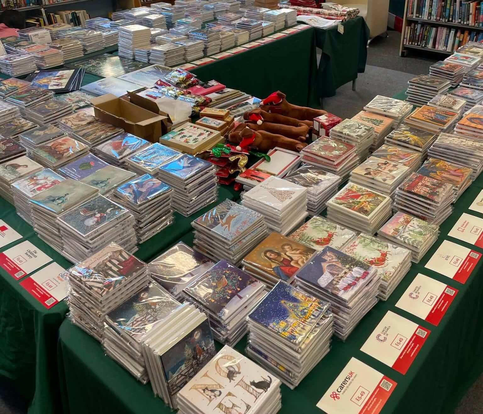Tables of charity Christmas cards on sale at Truro Community Library
