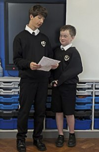 Two Treviglas Academy students presenting their team's work