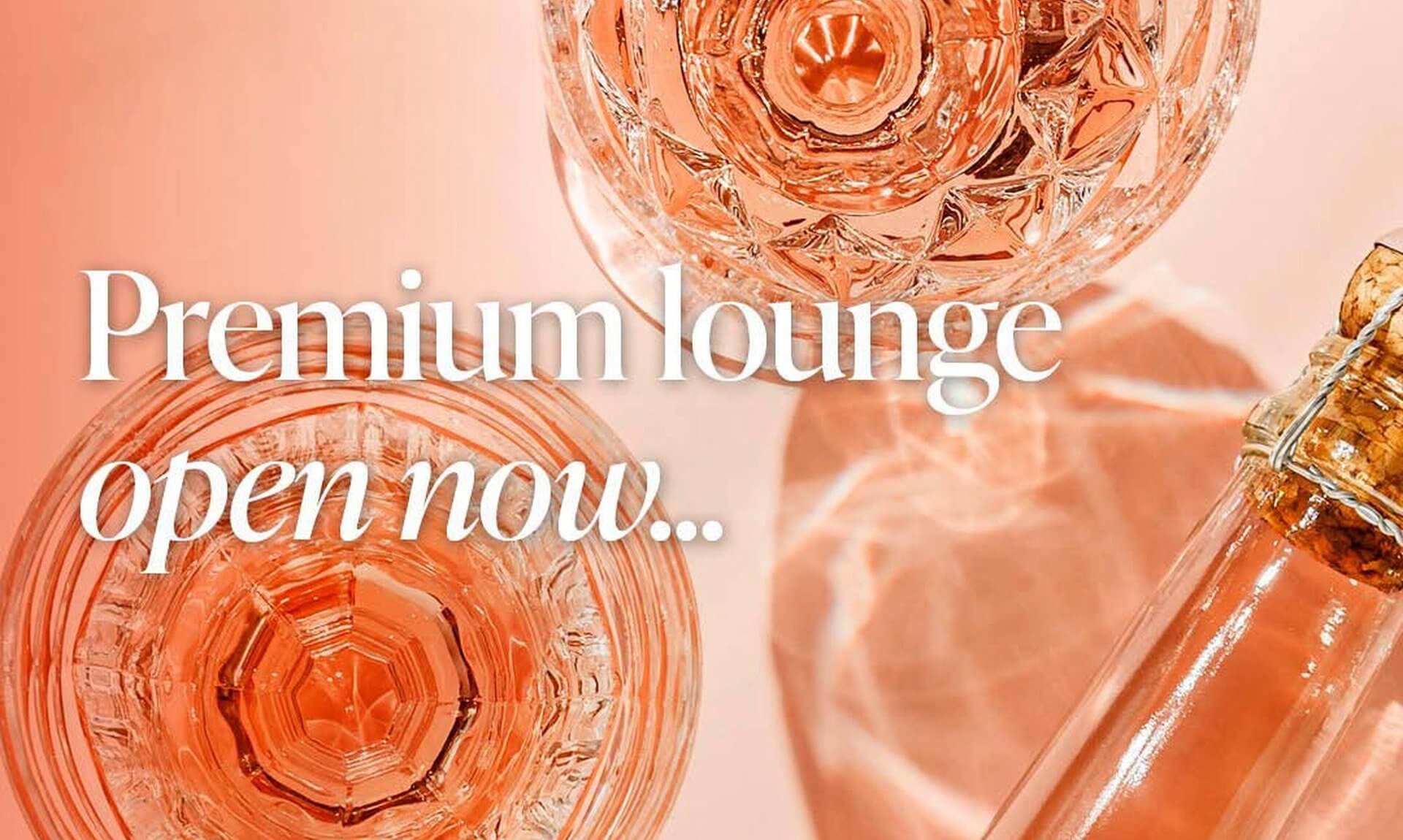 Atlantic Lounge promotional image showing glasses and a bottle of rosé at Cornwall Airport Newquay