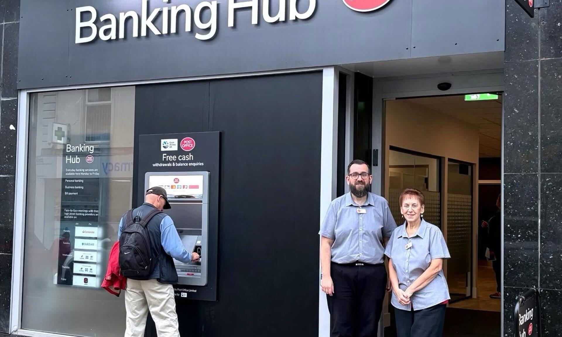 Staff outside Camborne Banking Hub on Trelowarren Street