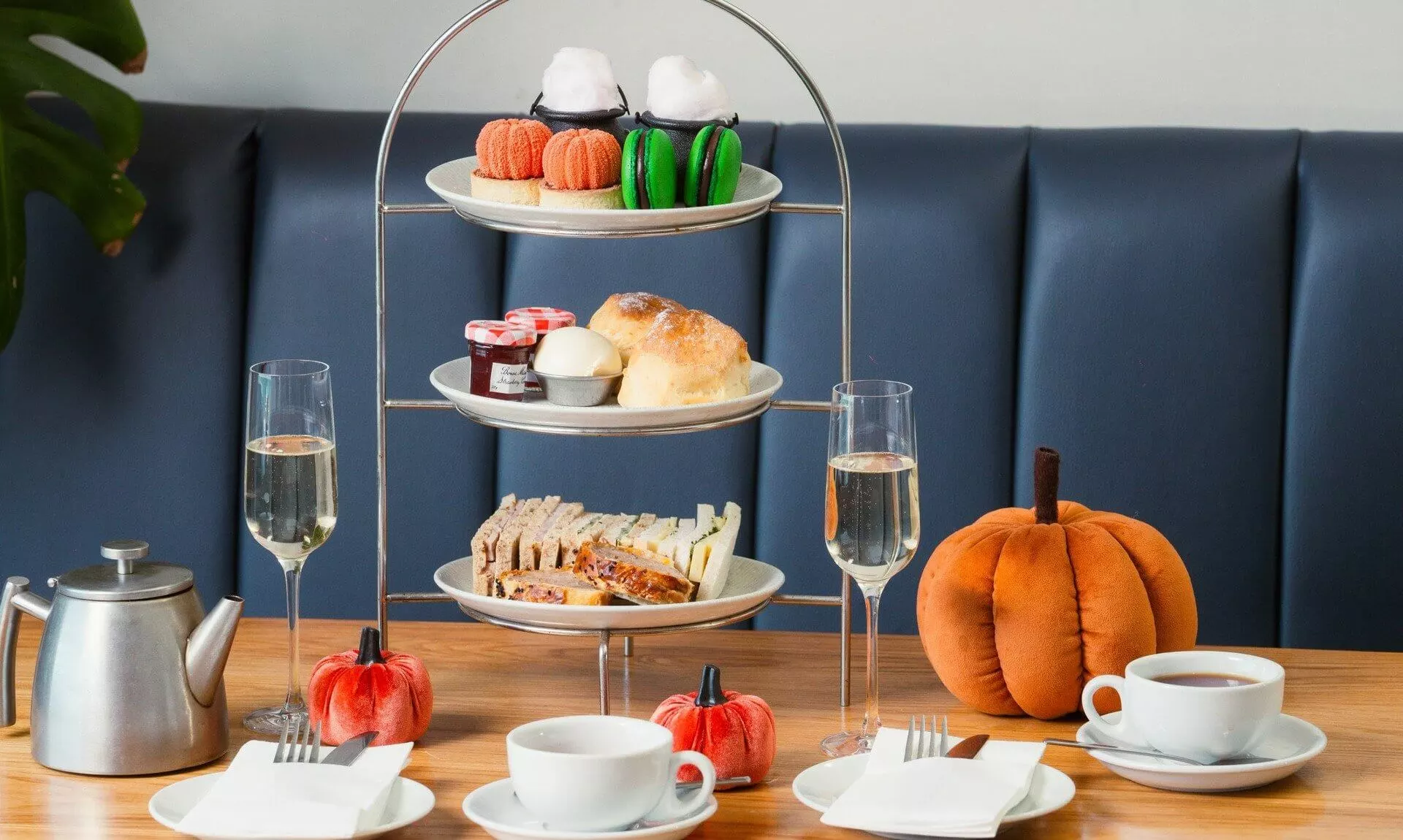 Halloween afternoon tea stand with sparkling wine and a pumpkin at The Esplanade, Newquay
