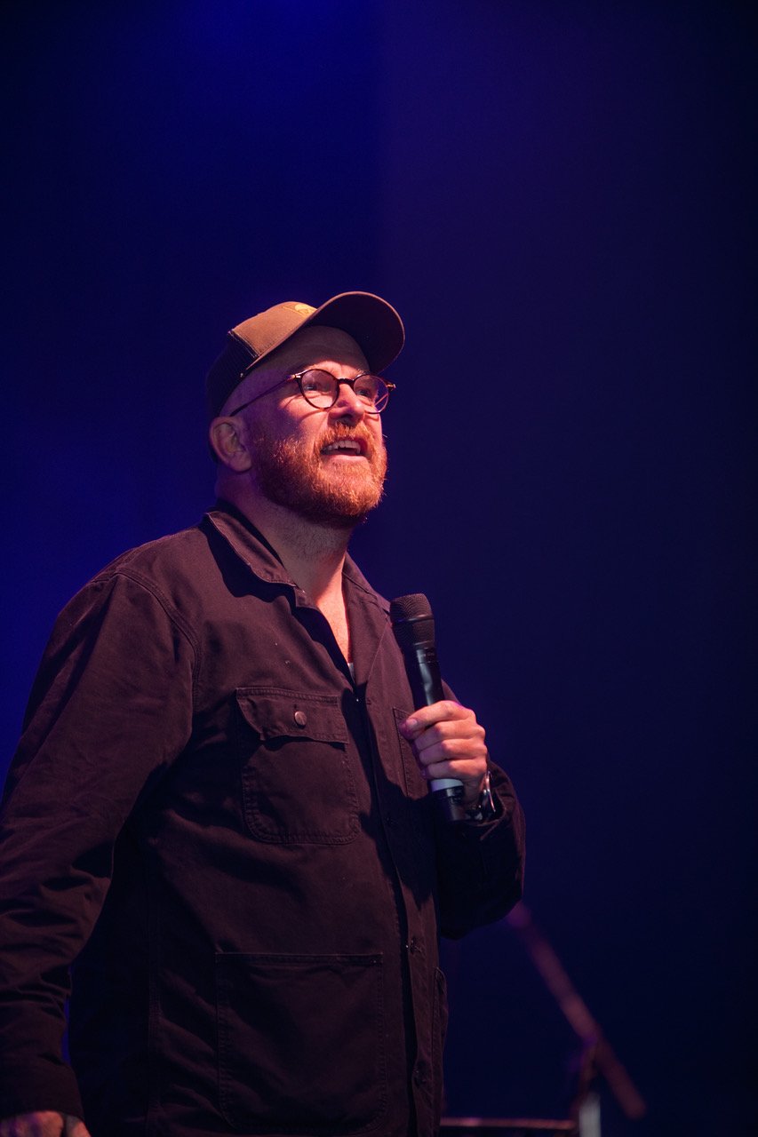 A performer on stage at Fisherman's Friends Festival