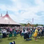 Crowds in front of the big top at Fisherman's Friends Festival, Stithians Showground