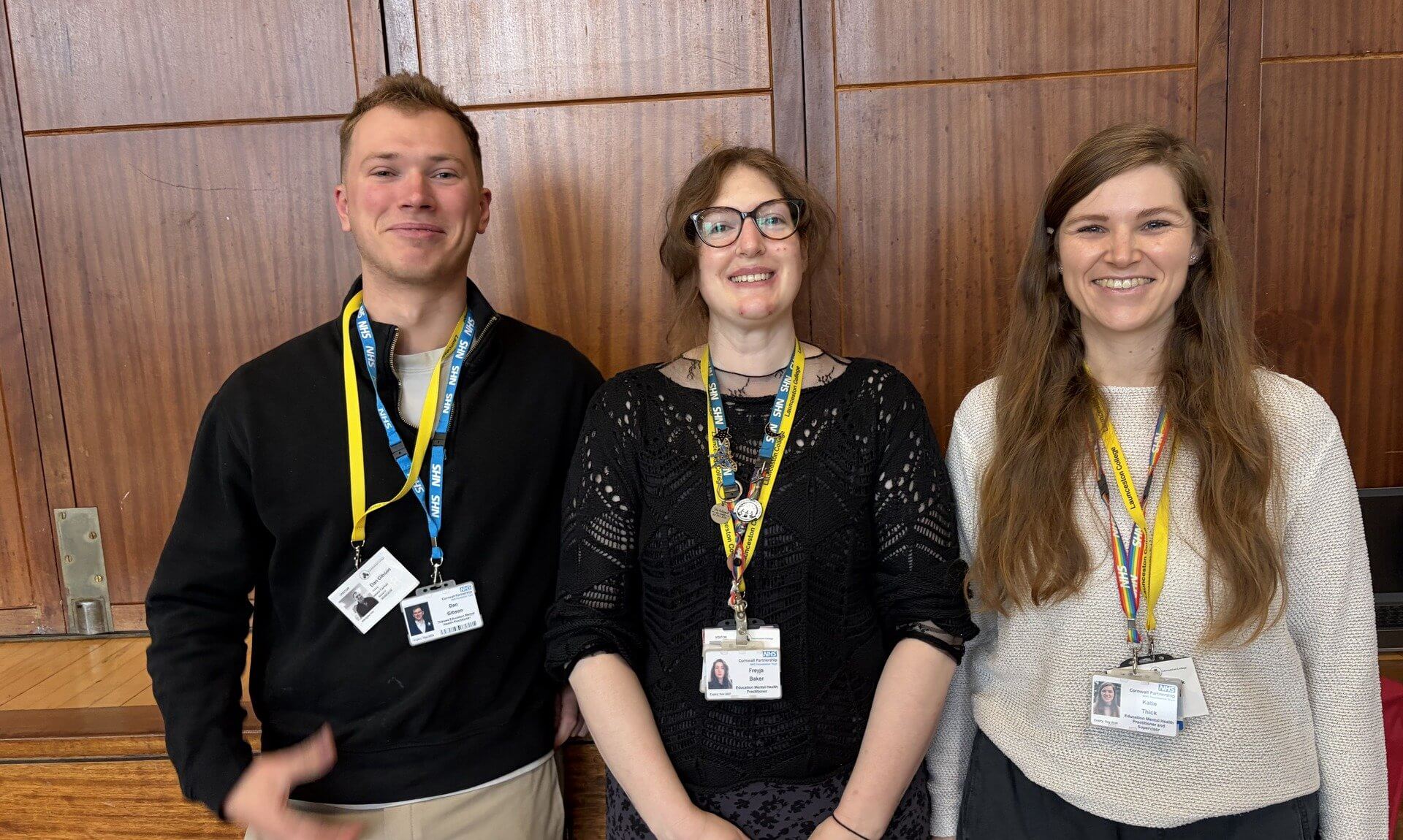 Dan Gibson, Freyja Baker and Katie Thick wearing NHS lanyards at Launceston College