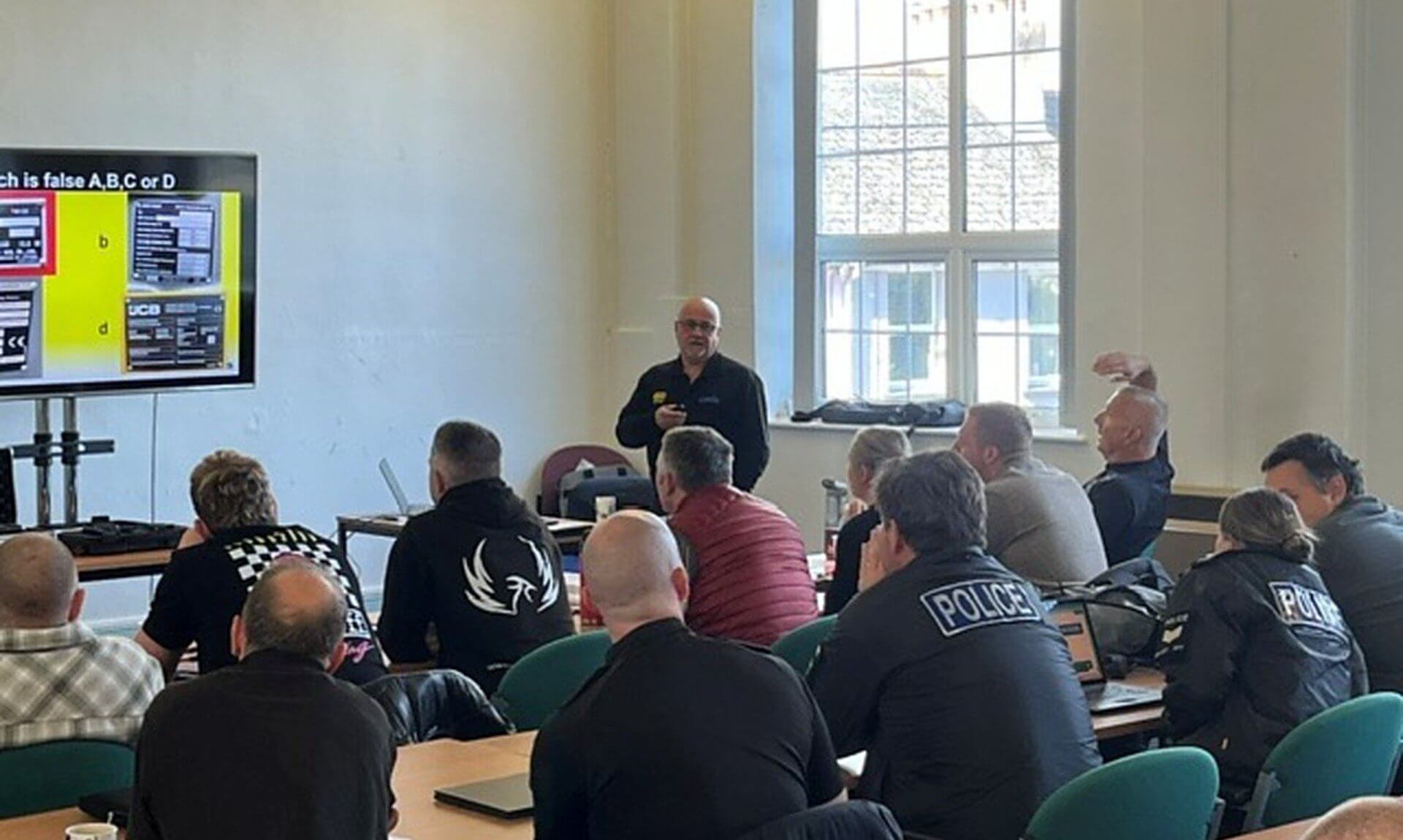 VIN Chip trainer leading a machinery identification session for police officers at Okehampton