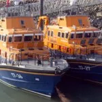 Severn class lifeboats Ivan Ellen and Volunteer Spirit moored side by side in Newlyn harbour
