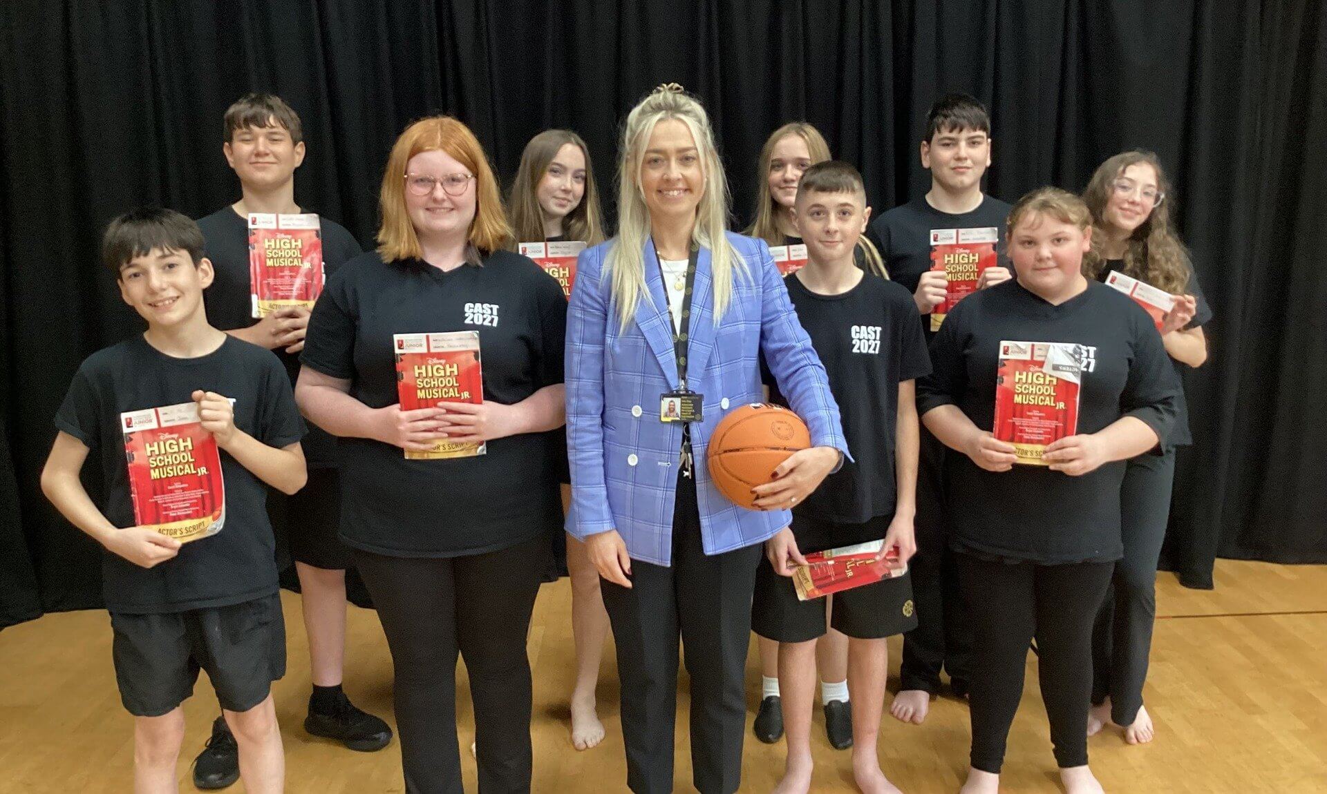 Lydia Day with members of the High School Musical Jr. cast at Pool Academy