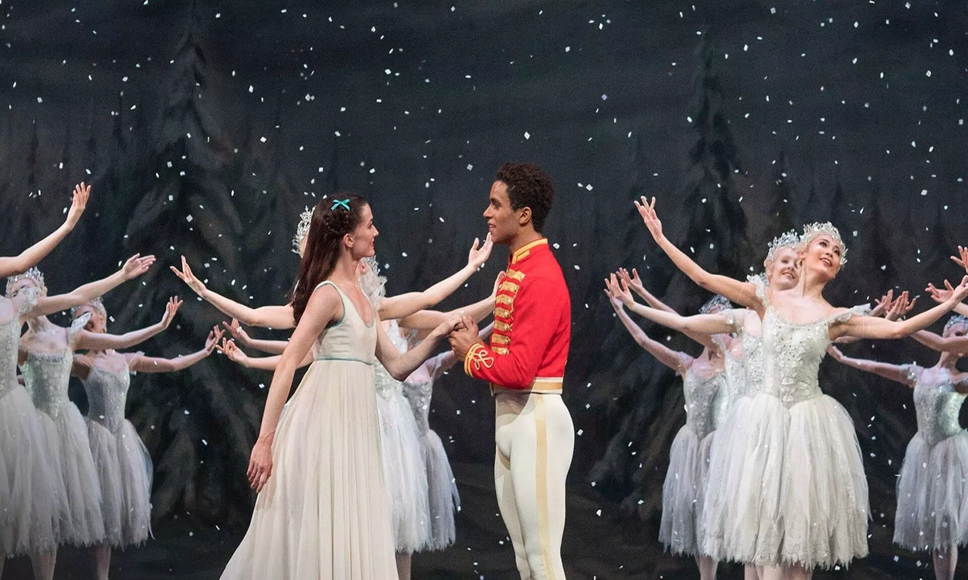 The Royal Ballet's The Nutcracker on stage with snowflake dancers