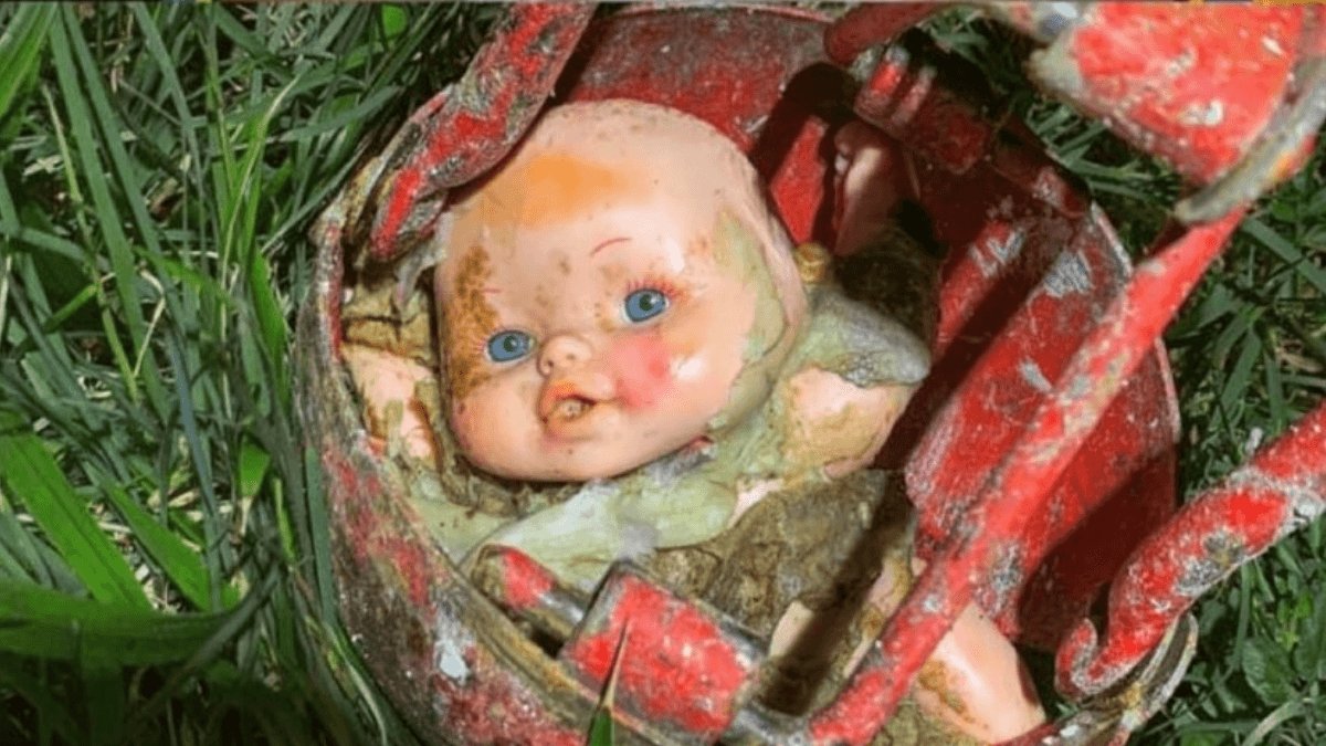 Mud-covered baby doll found blocking a sewer in Exmouth