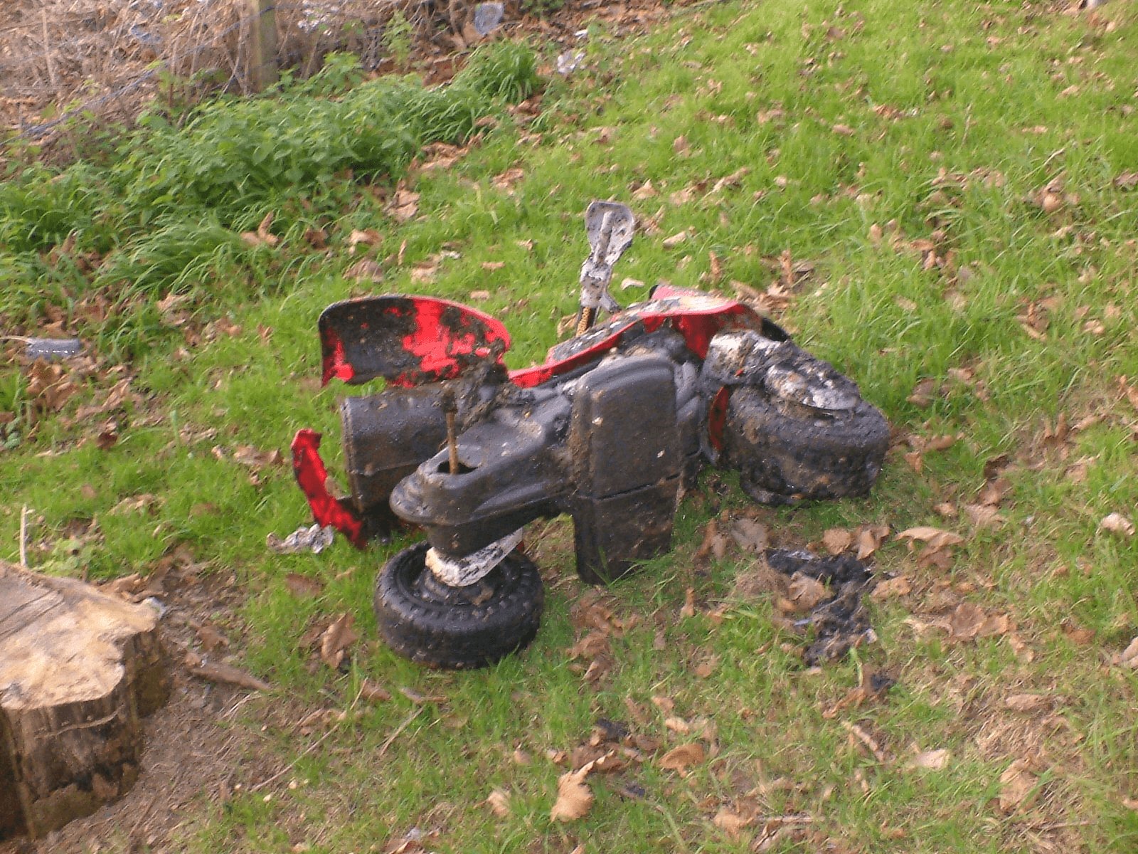 Battered children's ride-on toy recovered from underground