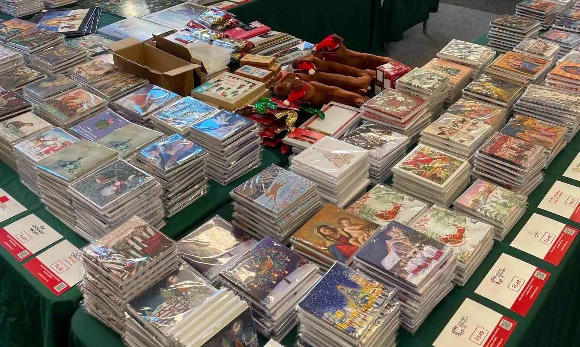 Tables of charity Christmas cards on sale at Truro Community Library
