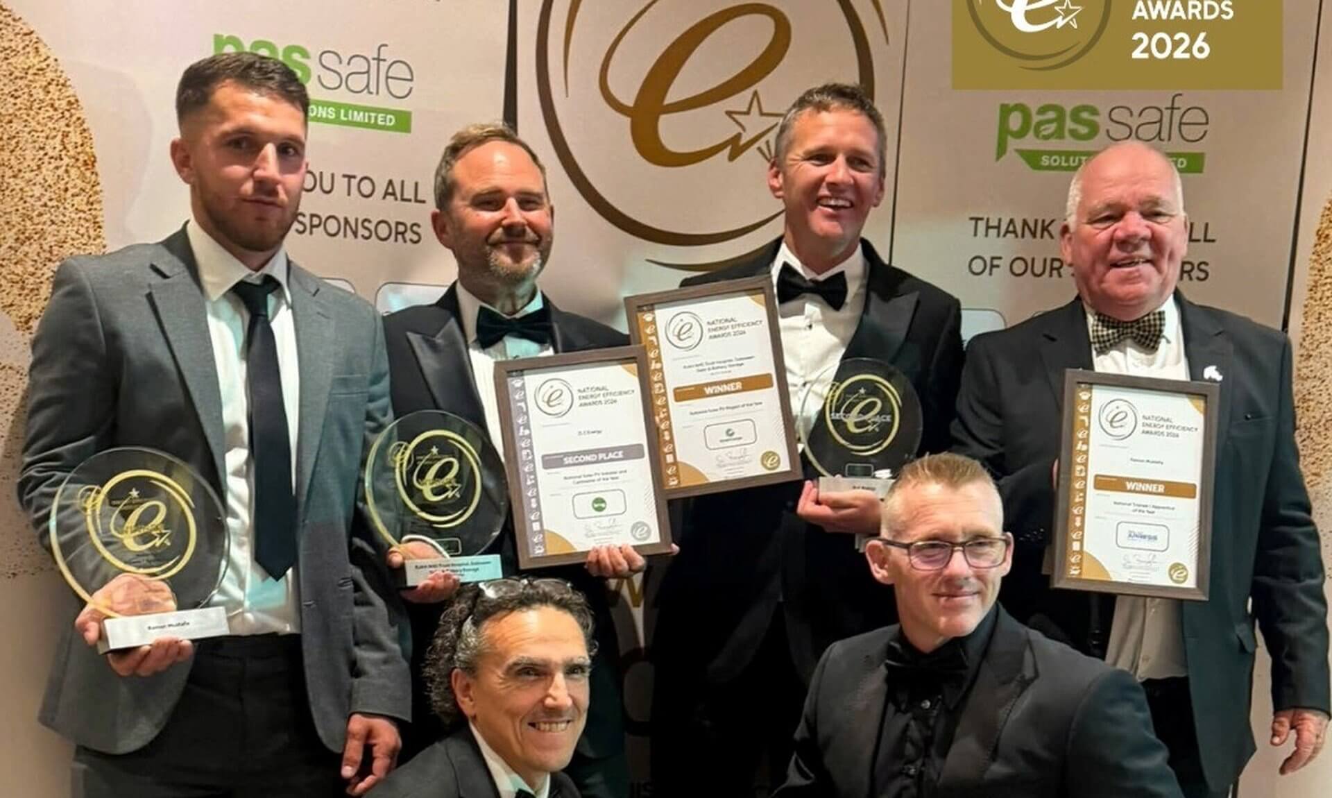 The ZLC Energy team holding trophies and framed certificates at the National Energy Efficiency Awards 2026